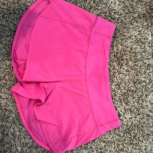 Pink lululemon speed up shorts